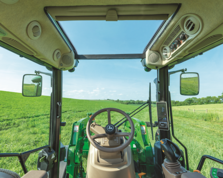 Front view from the operating seat of the John Deere 5125R Utility Tractor